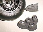 In-line skate wheel, elastomeric keypad, and elastomer overmolded polycarbonate actuator.
